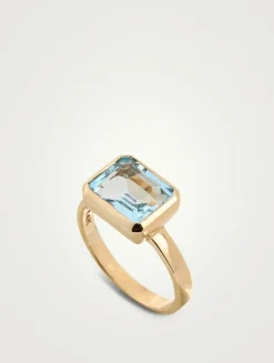 Cléo Daniela 14K Gold Bezel Emerald Cut Blue Topaz Ring