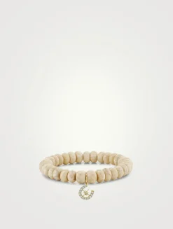 Cream Jasper Smooth Rondelle Beaded Bracelet With Starburst Horseshoe Charm
