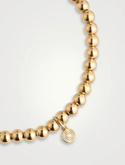 Gold Beaded Bracelet With 14K Gold Small Fluted Diamond Charm