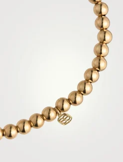 14K Gold Beaded Bracelet With Small 14K Diamond Hummingbird Charm