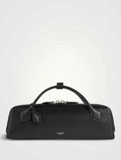 Le Teckel Leather Clutch