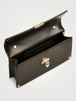 Mini Rockstud Leather Top Handle Bag