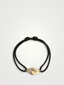 Small Menottes Dinh Van Cord Bracelet With 18K Gold And Diamonds